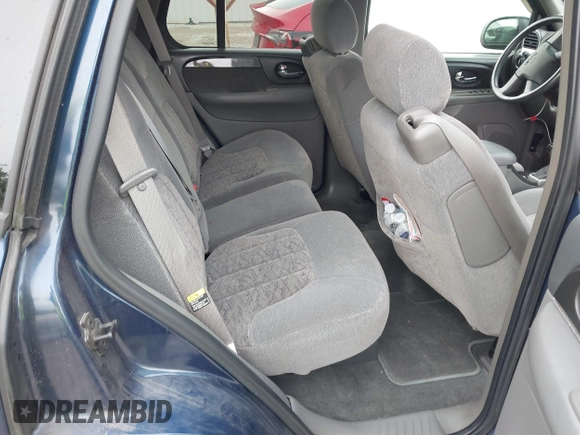 2003 GMC Envoy SLT z VIN 1GKDS13S532309264, wystawiony jako IAAI lot #42200597 z przebiegiem 86 728 mil mil oraz . Historia ofert i sprzedaży dostępna na DreamBid. Obrazek 8.