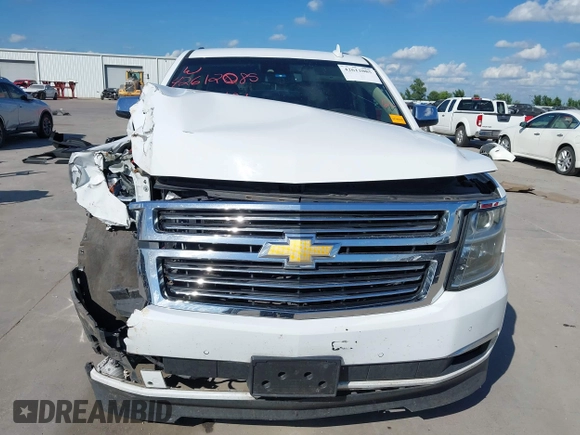 2016 Chevrolet Suburban LTZ with VIN 1GNSKJKC0GR109295, listed as a IAAI auction lot 42612085 with 200,912 mi miles and . Bid and sale history available at DreamBid. Image 12.