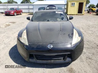 2011 Nissan 370Z Touring z VIN JN1AZ4EHXBM553057, wystawiony jako Copart lot #58557165 z przebiegiem 110 714 mil mil oraz Szkoda całkowita • Salvage title. Historia ofert i sprzedaży dostępna na DreamBid. Obrazek 5.