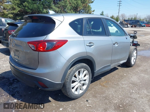 2013 Mazda CX-5 Grand Touring with VIN JM3KE4DE9D0137085, listed as a IAAI auction lot 41978534 with 103,720 mi miles and . Bid and sale history available at carsss.com. Image 4.