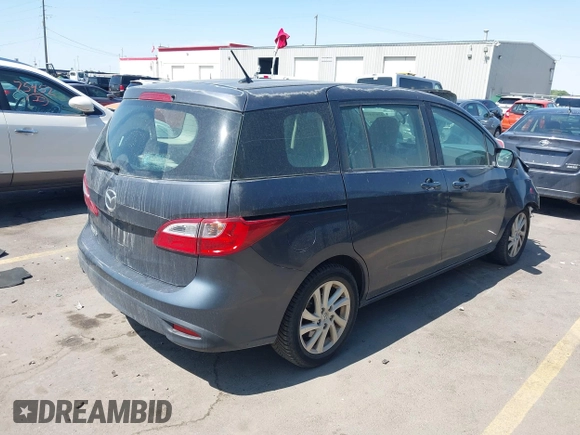 2012 Mazda 5 Sport with VIN JM1CW2BL1C0116150, listed as a IAAI auction lot 42571812 with 124,236 mi miles and . Bid and sale history available at DreamBid. Image 4.