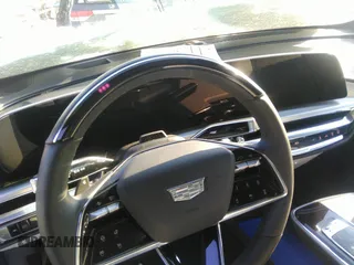 2024 Cadillac LYRIQ z VIN 1GYKPVRL8RZ128147, wystawiony jako IAAI lot #41273392 z przebiegiem 1 927 mil mil oraz . Historia ofert i sprzedaży dostępna na DreamBid. Obrazek 18.