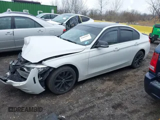 2018 BMW 3 Series 320i xDrive with VIN WBA8E5G52JNU46803, listed as a IAAI auction lot 41869625 with 67,057 mi miles. Bid and sale history available at carsss.com. Image 19.