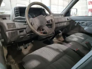 1995 Isuzu Pickup S z VIN JAACL11L0S7211543, wystawiony jako Copart lot #81881194 z przebiegiem 215 222 mil mil oraz Szkody całkowita. Historia ofert i sprzedaży dostępna na DreamBid. Obrazek 8.