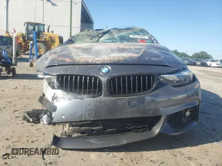 2019 BMW 4 Series 430i xDrive z VIN WBA4J3C59KBL05590, wystawiony jako Copart lot #57723065 z przebiegiem Nie podano mil oraz Szkoda całkowita • Salvage title. Historia ofert i sprzedaży dostępna na DreamBid. Obrazek 5.