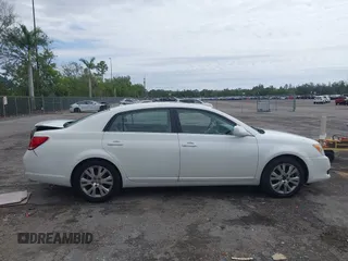 2010 Toyota Avalon XL with VIN 4T1BK3DB8AU354533, listed as a IAAI auction lot 41802797 with 117,956 mi miles and . Bid and sale history available at carsss.com. Image 13.