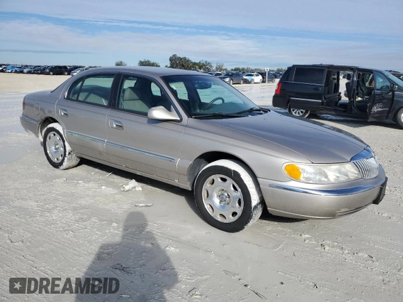 1999 Lincoln Continental с VIN 1LNHM97V8XY671775, выставлен на аукционе Copart как лот 42429965 с пробегом 79 851 миль миль и Чистый • Clean title. История ставок и продаж доступна на DreamBid. Изображение 4.