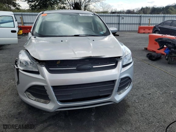 2016 Ford Escape SE with VIN 1FMCU9GX5GUB33778, listed as a Copart auction lot 52926825 with 121,282 mi miles and Salvage Title. Bid and sale history available at carsss.com. Image 5.