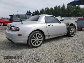 2008 Mazda MX-5 Miata Touring with VIN JM1NC26F780146072, listed as a Copart auction lot 65602695 with 124,607 mi miles and Salvage title. Bid and sale history available at DreamBid. Image 3.