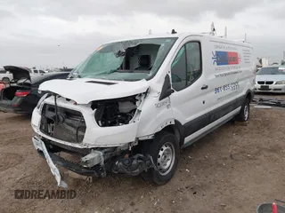 2023 Ford Transit Cargo with VIN 1FTYE1Y82PKB92413, listed as a IAAI auction lot 41702808 with 20,144 mi miles and . Bid and sale history available at DreamBid. Image 2.
