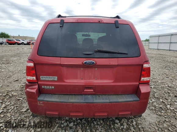 2012 Ford Escape XLT z VIN 1FMCU9D78CKB47457, wystawiony jako Copart lot #61683095 z przebiegiem 144 174 mil mil oraz Czysty tytuł • Clean title. Historia ofert i sprzedaży dostępna na DreamBid. Obrazek 6.