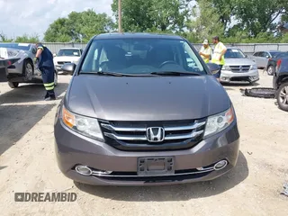 2014 Honda Odyssey Touring with VIN 5FNRL5H99EB138952, listed as a IAAI auction lot 42538833 with 146,959 mi miles and . Bid and sale history available at DreamBid. Image 12.