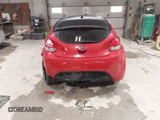 2012 Hyundai Veloster w/Black Int z VIN KMHTC6AD8CU032759, wystawiony jako IAAI lot #41567265 z przebiegiem 156 973 mil mil oraz . Historia ofert i sprzedaży dostępna na DreamBid. Obrazek 16.
