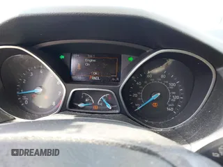 2017 Ford Focus SE with VIN 1FADP3F2XHL243371, listed as a IAAI auction lot 42147795 with 169,188 mi miles. Bid and sale history available at carsss.com. Image 7.