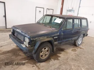 1996 Jeep Cherokee SE z VIN 1J4FJ28S8TL200825, wystawiony jako IAAI lot #42513038 z przebiegiem 226 914 mil mil oraz . Historia ofert i sprzedaży dostępna na DreamBid. Obrazek 2.