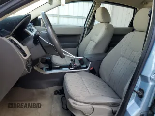 2009 Ford Focus SE z VIN 1FAHP35N69W183425, wystawiony jako Copart lot #54560985 z przebiegiem 159 305 mil mil oraz Szkoda całkowita • Salvage title. Historia ofert i sprzedaży dostępna na DreamBid. Obrazek 7.