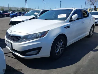 2013 Kia Optima LX with VIN KNAGM4A71D5383314, listed as a IAAI auction lot 41812942 with 228,220 mi miles. Bid and sale history available at carsss.com. Image 2.