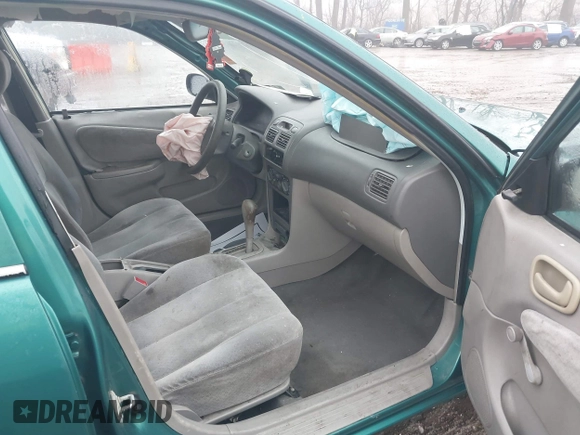 1998 Toyota Corolla VE with VIN 1NXBR12E6WZ094363, listed as a IAAI auction lot 41465384 with 265,919 mi miles and . Bid and sale history available at DreamBid. Image 5.