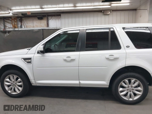 2013 Land Rover LR2 with VIN SALFR2BG6DH338217, listed as a IAAI auction lot 42593902 with 105,943 mi miles and . Bid and sale history available at DreamBid. Image 14.