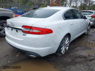 2014 Jaguar XF V6 SC with VIN SAJWJ0EF9E8U32052, listed as a IAAI auction lot 41542500 with 74,550 mi miles. Bid and sale history available at carsss.com. Image 4.