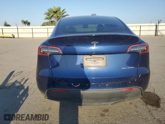 2023 Tesla Model Y Long Range with VIN 7SAYGDEE7PA146322, listed as a Copart auction lot 54071165 with 38,334 mi miles and Salvage Title. Bid and sale history available at DreamBid. Image 6.
