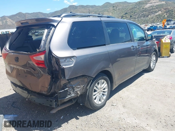 2016 Toyota Sienna XLE with VIN 5TDYK3DCXGS722960, listed as a IAAI auction lot 42153794 with 147,331 mi miles. Bid and sale history available at carsss.com. Image 4.