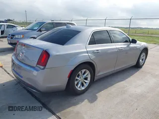 2016 Chrysler 300 Anniversary Edition with VIN 2C3CCAAG9GH211875, listed as a IAAI auction lot 42052083 with 209,251 mi miles and . Bid and sale history available at DreamBid. Image 4.