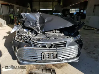 2020 Toyota Avalon Hybrid XLE z VIN 4T1A21FB7LU014807, wystawiony jako Copart lot #38368943 z przebiegiem 40 015 mil mil oraz . Historia ofert i sprzedaży dostępna na DreamBid. Obrazek 5.