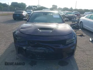 2021 Dodge Charger Scat Pack Widebody with VIN 2C3CDXGJXMH559036, listed as a IAAI auction lot 41895328 with 55,017 mi miles and . Bid and sale history available at DreamBid. Image 12.