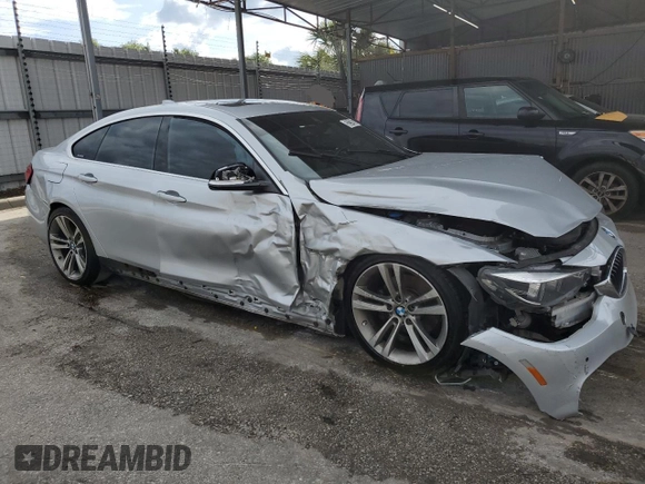 2019 BMW 4 Series 430i with VIN WBA4J1C57KBM13243, listed as a Copart auction lot 52214625 with 87,246 mi miles and Clean Title. Bid and sale history available at DreamBid. Image 4.