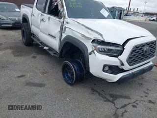2023 Toyota Tacoma 4WD SR with VIN 3TMCZ5AN0PM550641, listed as a IAAI auction lot 41929355 with 18,917 mi miles. Bid and sale history available at carsss.com. Image 1.
