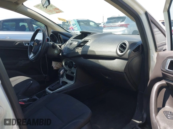 2014 Ford Fiesta SE with VIN 3FADP4BJ0EM172033, listed as a IAAI auction lot 42153874 with 155,640 mi miles. Bid and sale history available at carsss.com. Image 5.