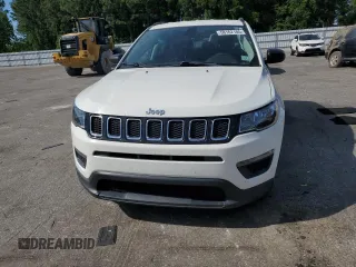 2018 Jeep Compass Sport with VIN 3C4NJCAB7JT140622, listed as a Copart auction lot 58162185 with 128,686 mi miles and Salvage title. Bid and sale history available at DreamBid. Image 5.