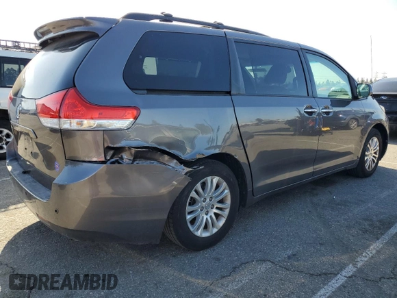 2013 Toyota Sienna XLE AAS with VIN 5TDYK3DC8DS323329, listed as a Copart auction lot 51957005 with 157,638 mi miles and Salvage title. Bid and sale history available at DreamBid. Image 3.