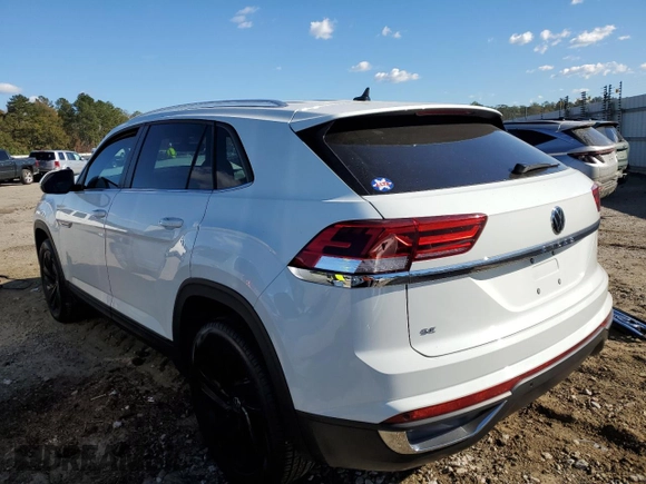 2023 Volkswagen Atlas SE z VIN 1V2WC2CA7PC212807, wystawiony jako Copart lot #78803313 z przebiegiem 8 806 mil mil oraz . Historia ofert i sprzedaży dostępna na DreamBid. Obrazek 2.