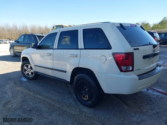 2007 Jeep Grand Cherokee Laredo with VIN 1J8HS48PX7C657685, listed as a IAAI auction lot 41748528 with 247,534 mi miles. Bid and sale history available at carsss.com. Image 3.