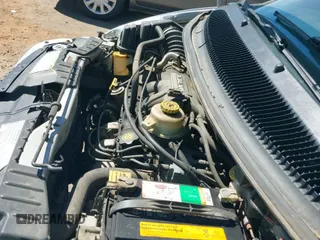 2002 Dodge Caravan Sport with VIN 1B4GP44342B559951, listed as a IAAI auction lot 42943618 with 132,533 mi miles and . Bid and sale history available at DreamBid. Image 12.