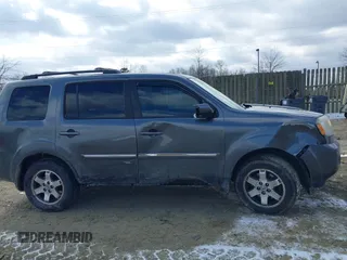 2011 Honda Pilot Touring with VIN 5FNYF4H98BB016012, listed as a IAAI auction lot 41634844 with 202,160 mi miles. Bid and sale history available at carsss.com. Image 13.