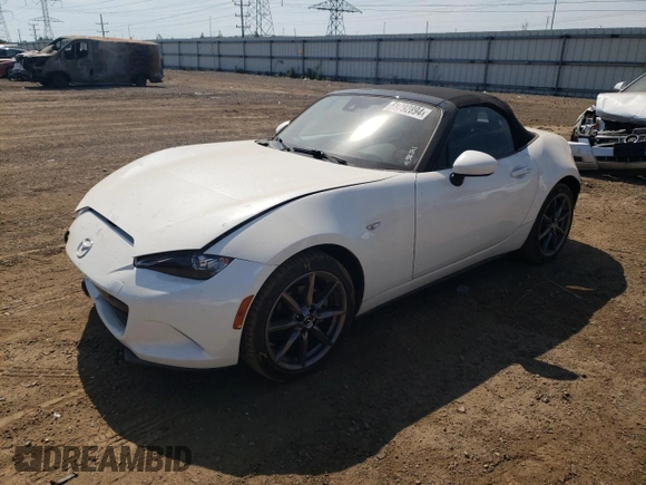 2020 Mazda MX-5 Miata Grand Touring z VIN JM1NDAD7XL0412292, wystawiony jako Copart lot #69792894 z przebiegiem 19 513 mil mil oraz Szkoda całkowita • Salvage title. Historia ofert i sprzedaży dostępna na DreamBid. Obrazek 1.