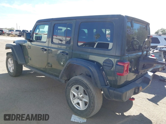 2023 Jeep Wrangler Rubicon with VIN 1C4JJXFG8PW518234, listed as a IAAI auction lot 40998757 with Not Provided miles and . Bid and sale history available at DreamBid. Image 3.
