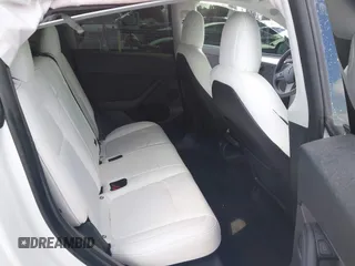 2022 Tesla Model Y Performance with VIN 7SAYGDEF1NF559572, listed as a IAAI auction lot 41516070 with 43,240 mi miles and . Bid and sale history available at DreamBid. Image 8.