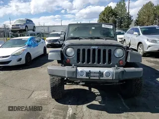 2008 Jeep Wrangler Sahara with VIN 1J4FA54108L625297, listed as a Copart auction lot 46832405 with 144,848 mi miles and Salvage title. Bid and sale history available at DreamBid. Image 11.