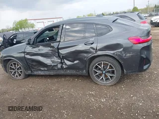 2023 BMW X4 xDrive30i with VIN 5UX33DT01P9N66552, listed as a IAAI auction lot 42103350 with 56,303 mi miles and . Bid and sale history available at DreamBid. Image 14.