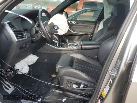 2021 BMW X5 M z VIN 5YMJU0C04M9F64315, wystawiony jako Copart lot #82029464 z przebiegiem Nie podano mil oraz Szkoda całkowita • Salvage title. Historia ofert i sprzedaży dostępna na DreamBid. Obrazek 7.