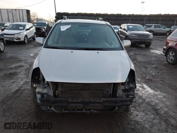 2007 Kia Sedona LX with VIN KNDMB233976172127, listed as a IAAI auction lot 41557356 with 164,383 mi miles. Bid and sale history available at carsss.com. Image 12.