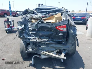 2013 Ford Escape SE z VIN 1FMCU9G91DUD55697, wystawiony jako IAAI lot #42184822 z przebiegiem 139 594 mil mil oraz . Historia ofert i sprzedaży dostępna na DreamBid. Obrazek 6.