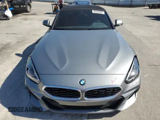 2024 BMW Z4 sDrive30i with VIN WBAHF3C06RWY36286, listed as a Copart auction lot 50296565 with 9,898 mi miles and Salvage title. Bid and sale history available at DreamBid. Image 5.