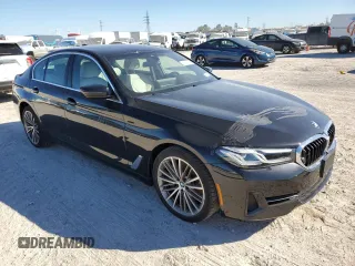 2023 BMW 5 Series 540i xDrive with VIN WBA73BJ03PCM49114, listed as a Copart auction lot 80693214 with 5,251 mi miles and Salvage Title. Bid and sale history available at carsss.com. Image 4.