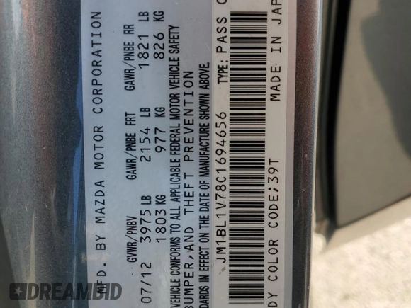 2012 Mazda 3 i Touring with VIN JM1BL1V78C1694656, listed as a Copart auction lot 51860975 with 146,193 mi miles and Salvage Title. Bid and sale history available at DreamBid. Image 13.