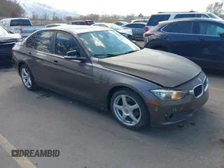 2014 BMW 3 Series 320i xDrive with VIN WBA3C3C58EF983816, listed as a IAAI auction lot 41949430 with 111,627 mi miles. Bid and sale history available at carsss.com. Image 1.